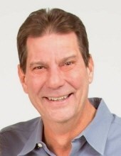 Obituary of John E. Tisza