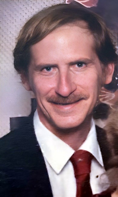 Obituary of Harlan E Marrill