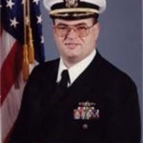Obituary of Commander James Joseph Adams