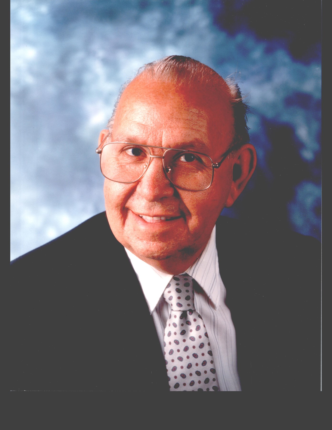 Obituary of John Elwood Riordan