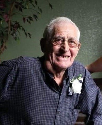 Obituary of Delbert (Bud) R. Holub