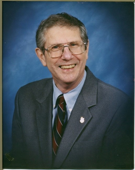Obituary of E. Paul Tousignant