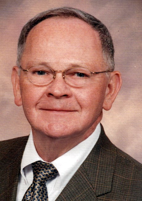 Obituario de Dr. Malcolm Reid Chitty