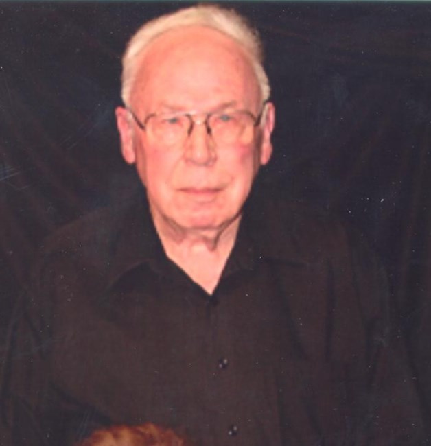 Obituary of Raymond W. Thomas