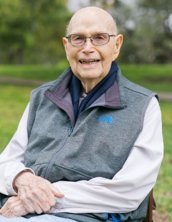 Obituary of John R. Meneghetti