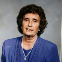 Obituary of Midge L. Woolard