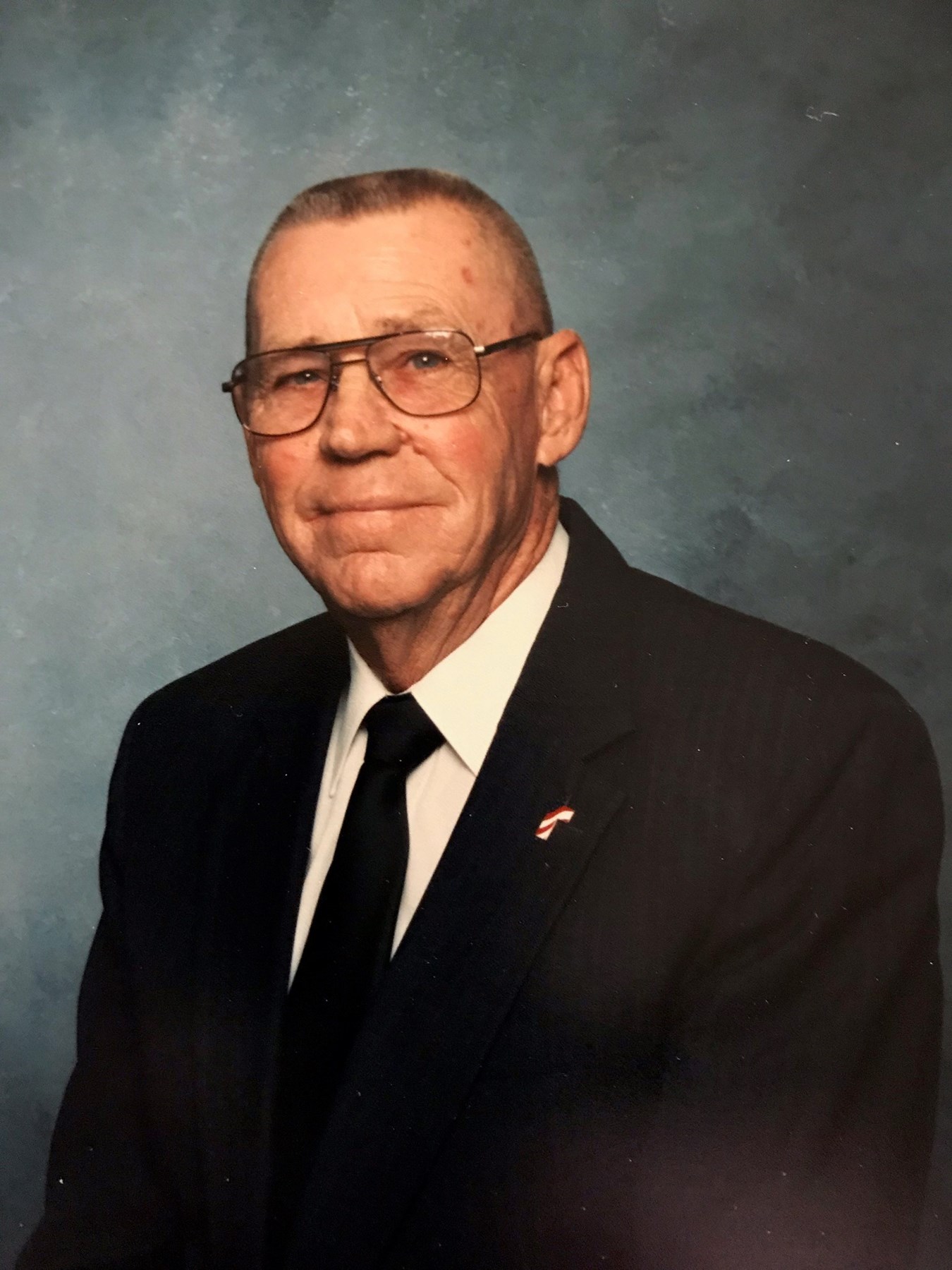 Obituary of John E Isom