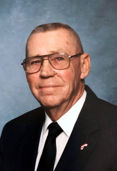 Obituary of John E Isom