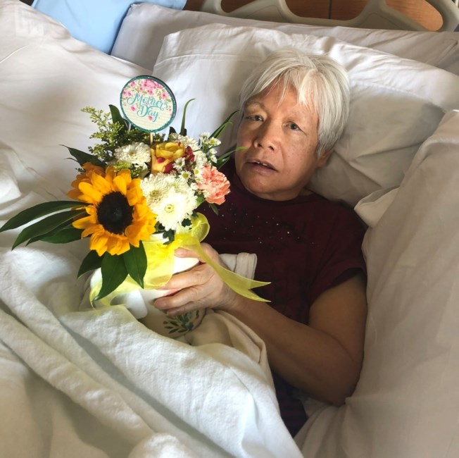 Obituary of Ai Zhong Tan