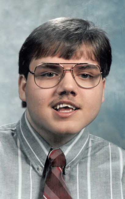 Obituary of Claude L. Parker