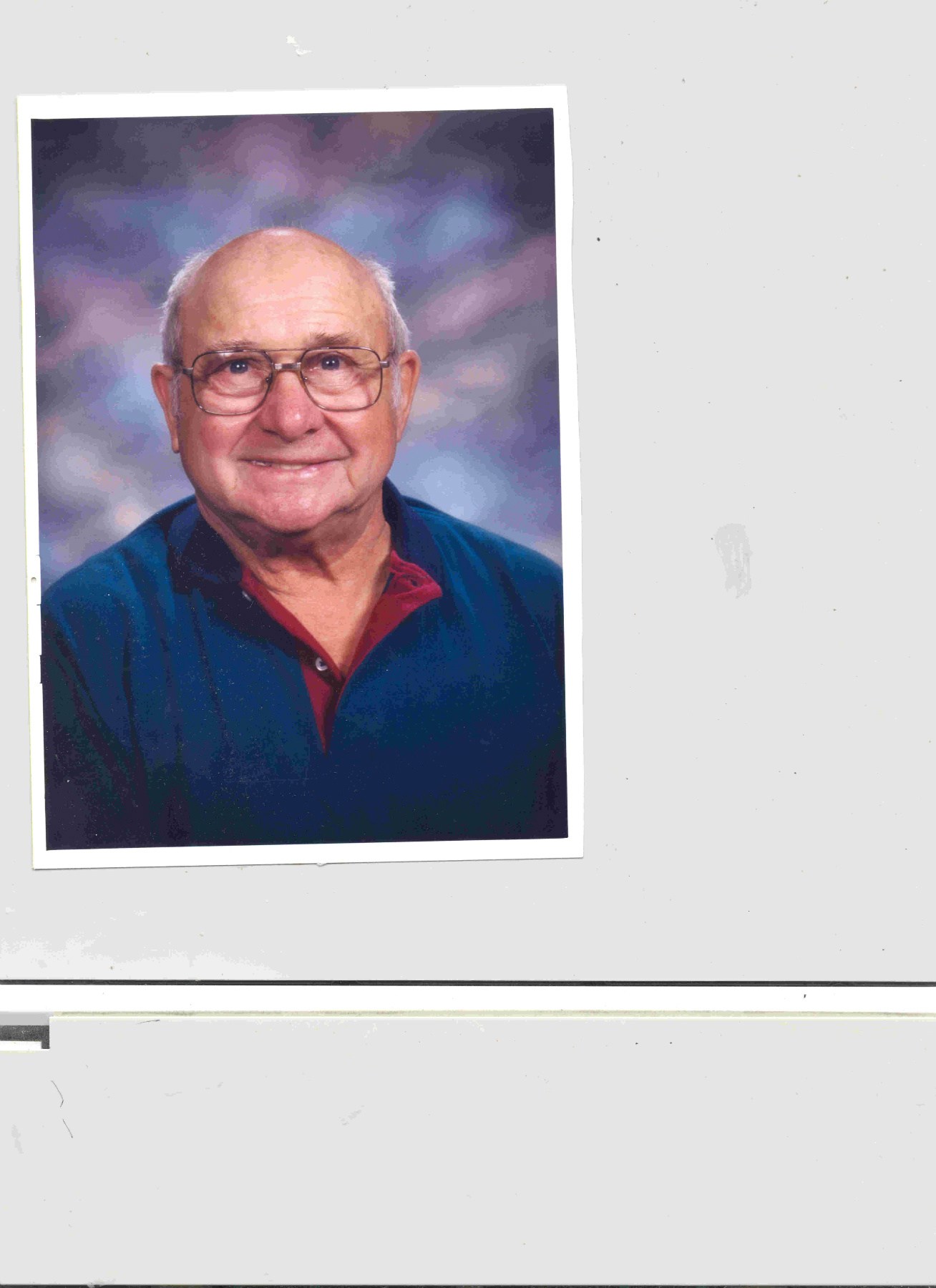 Obituary of Howard W Squire