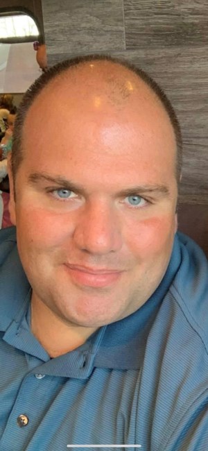 Obituary of Erich J Thomas