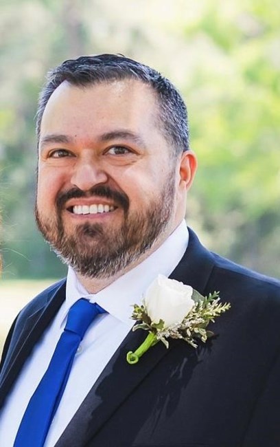 Obituary of Carlos Holguin