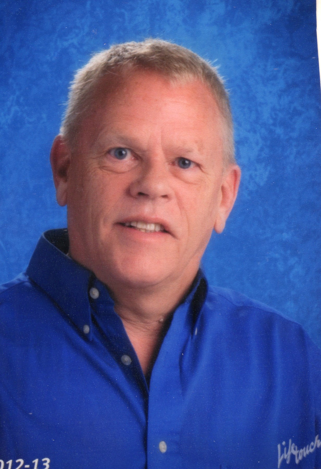 Obituary of Dr. Dennis Henzen