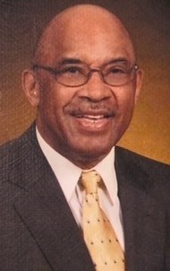 Obituary of John Edward Holcomb