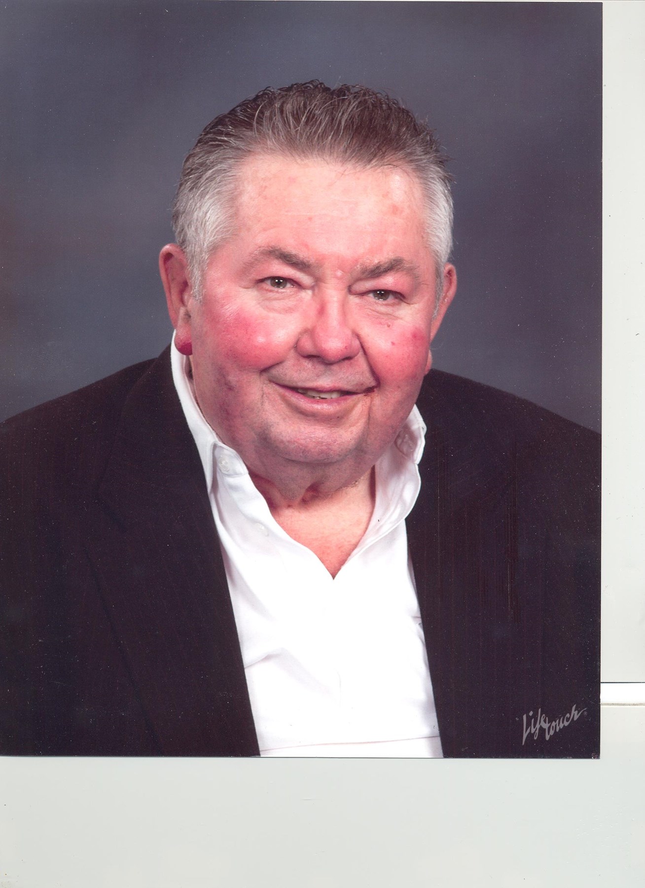 Obituario de George E. Honemann