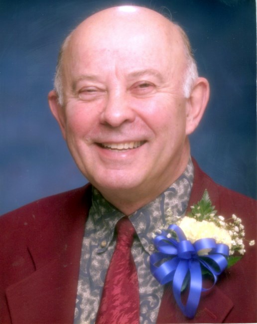 Obituary of John W Heide