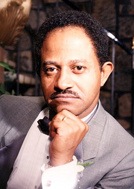 Obituary of Desmond A. Reid