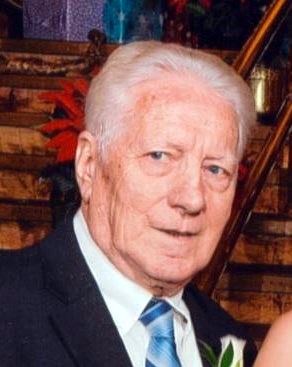 Obituary of Clarence "Whitey" J. Rhodes
