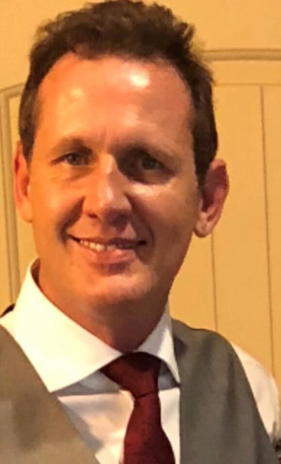 Obituary of John Brett Schneider