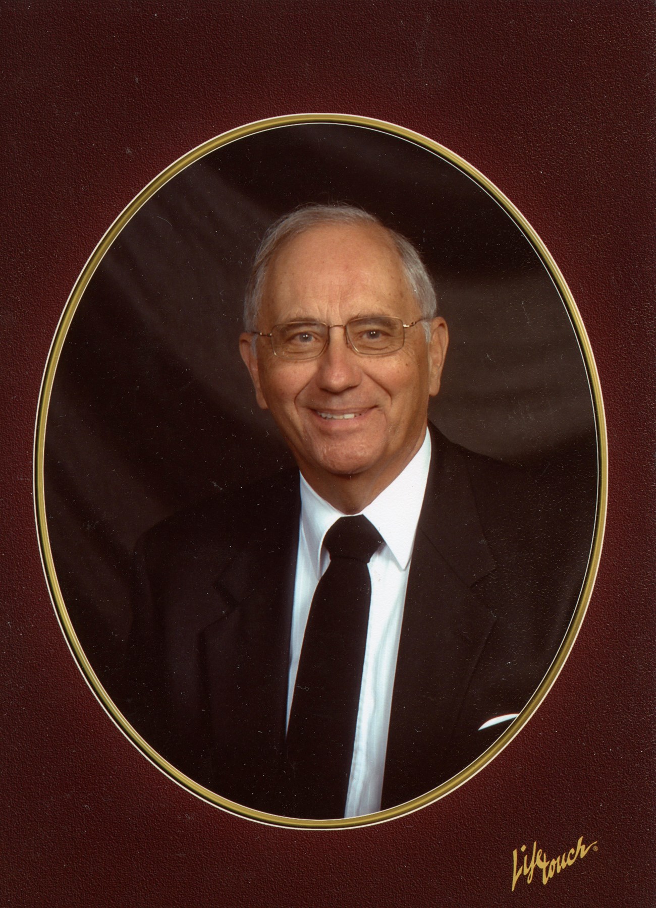 Obituary of John T. Glass
