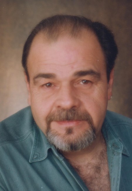 Obituary of M Guy Béchard