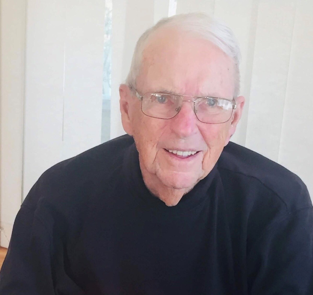 Obituary of John J McGlory