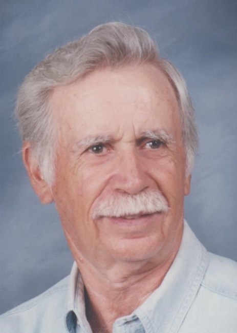 Obituary of John Dallas "Buck" Courville