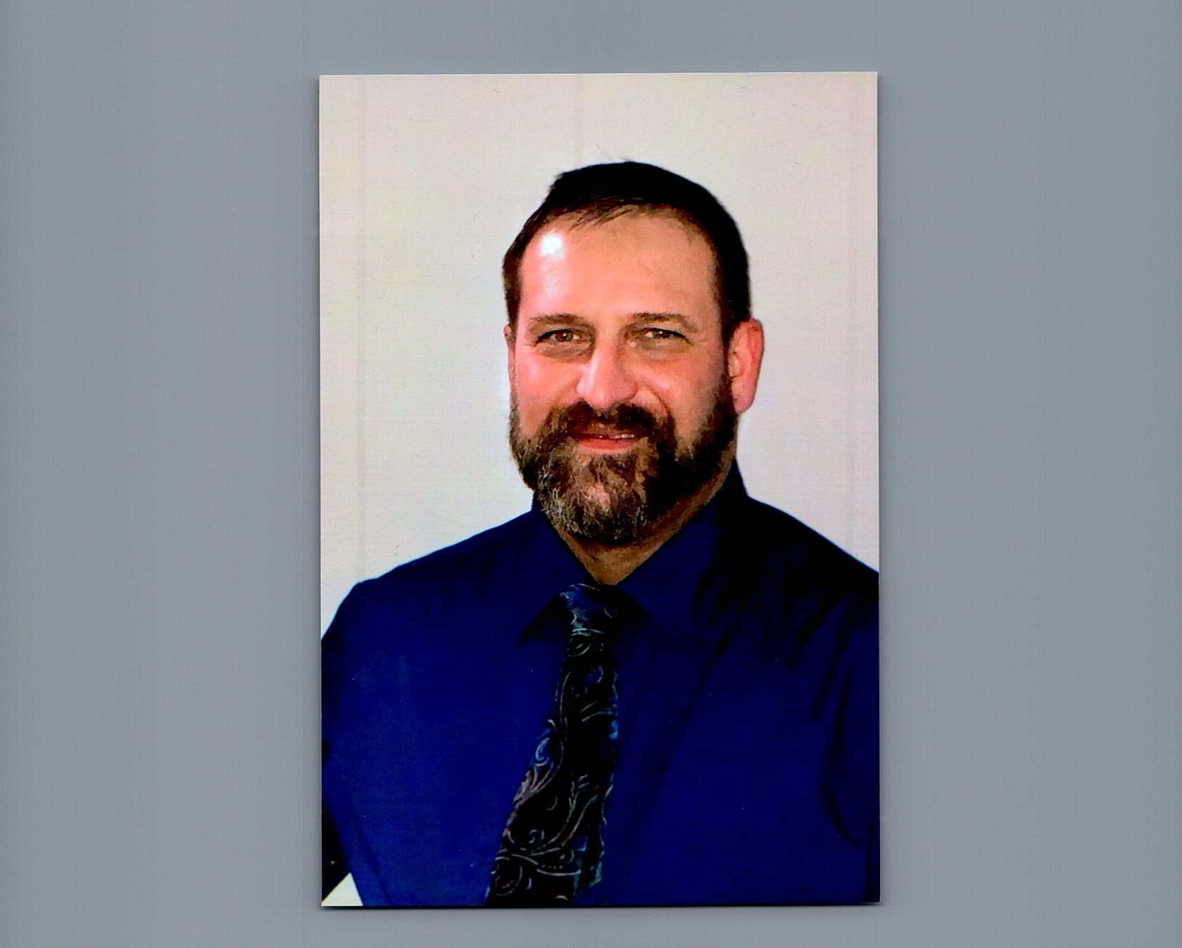 Obituary of Manuel A. Bairos