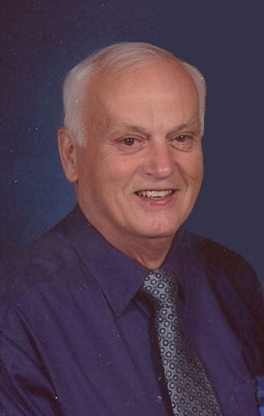 Obituary of John L. McCombs