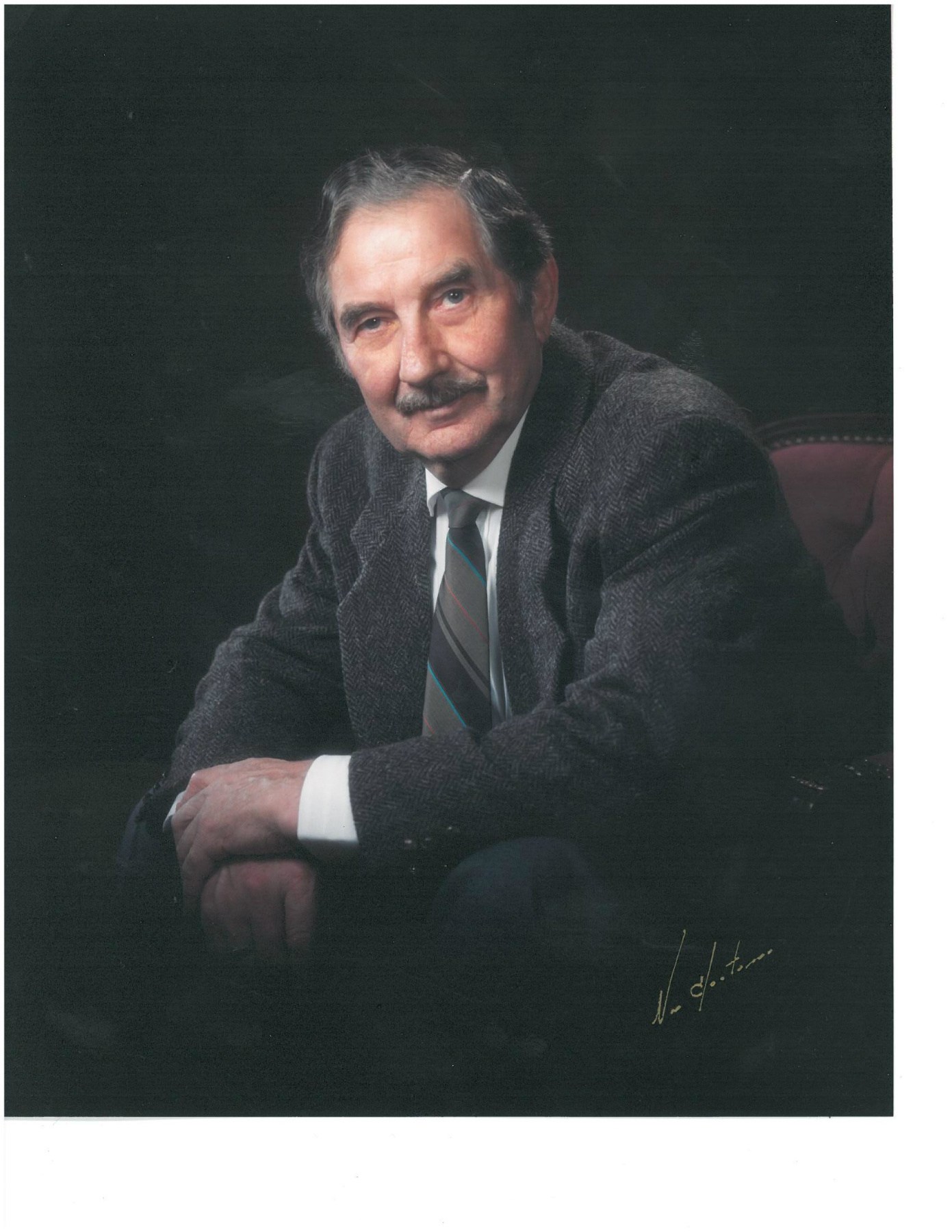 Obituary of Frank Wolf