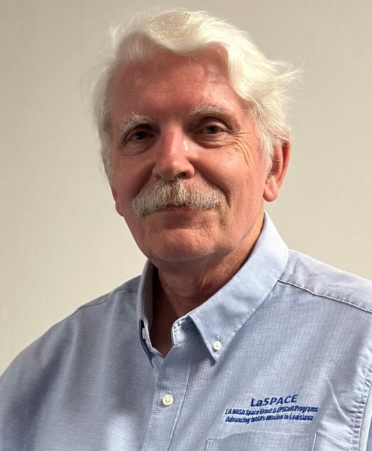 Obituary of T. Gregory Guzik