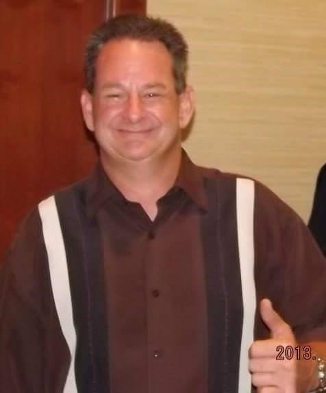 Obituary of John Eric Brewer