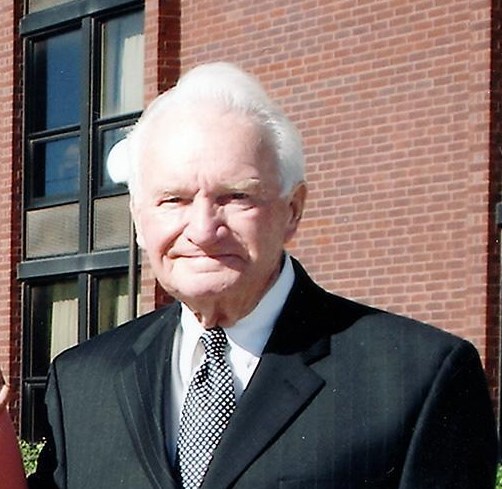 Obituary of John E. Woods