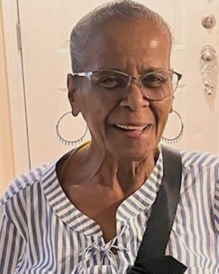 Obituary of Violet May Carroll