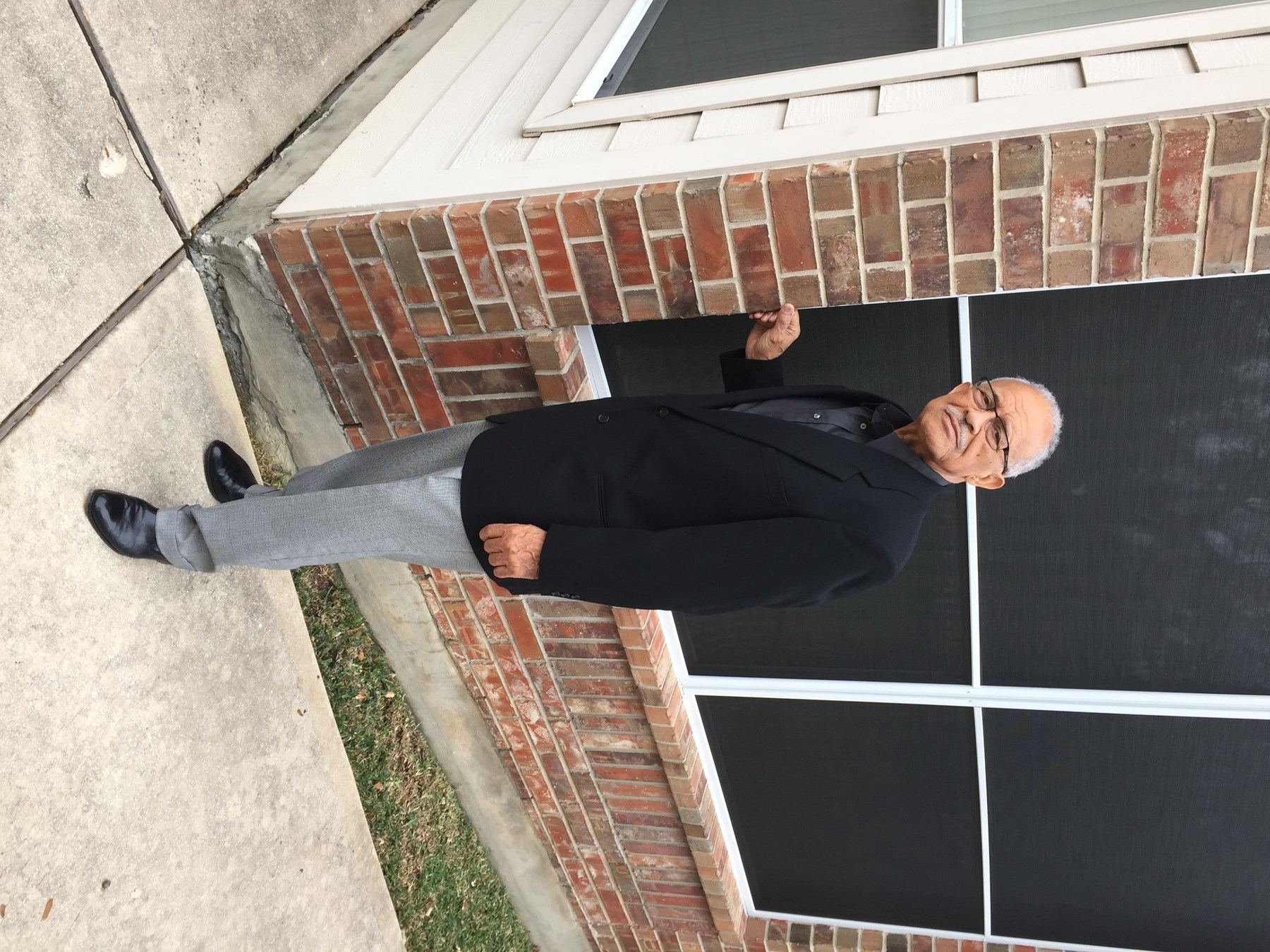 Obituary of John Thomas Holmes