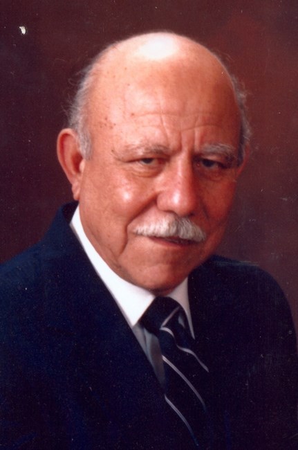 Obituary of Amador F. Holguin