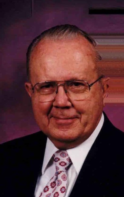 Obituary of John T. Larsen