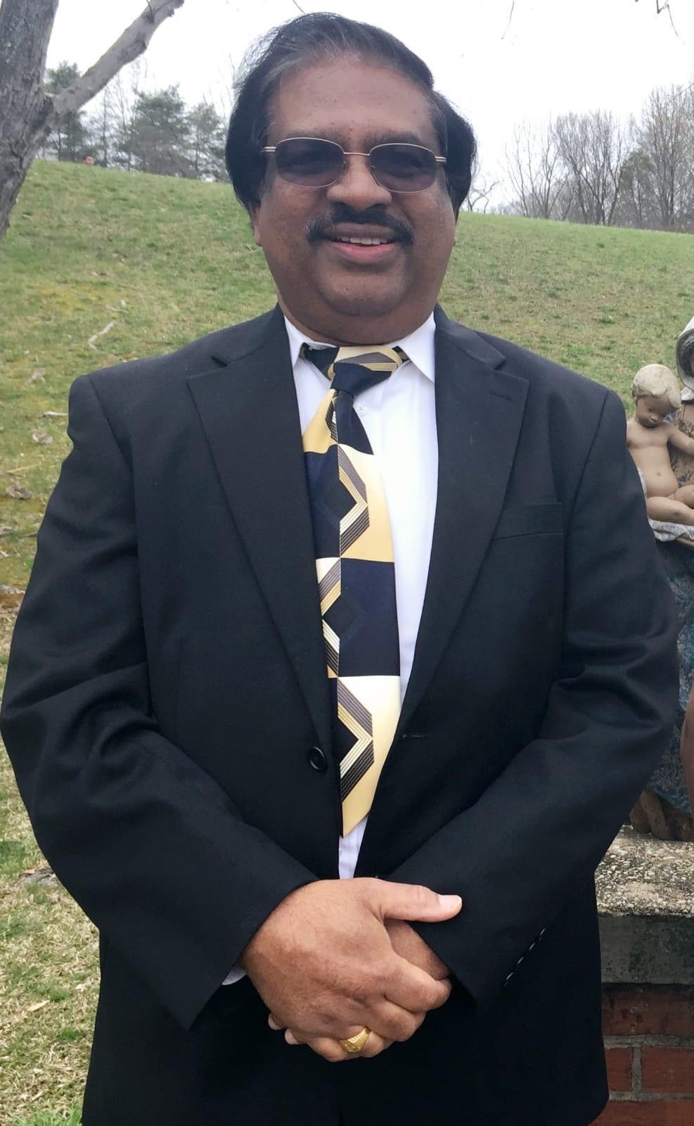 Obituary of Mathew John