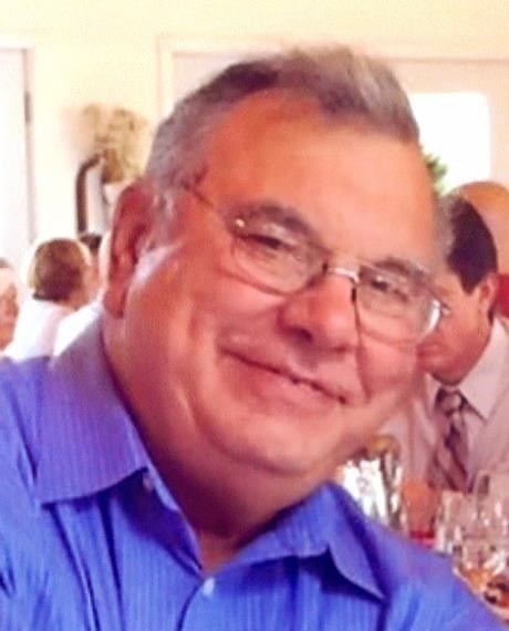 Obituary of Roland J. Roux