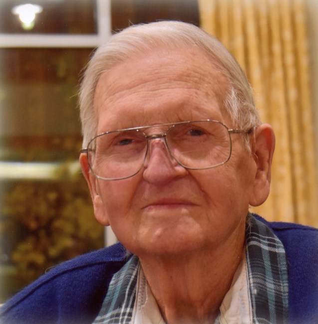 Obituary of John Marvin Ahrens
