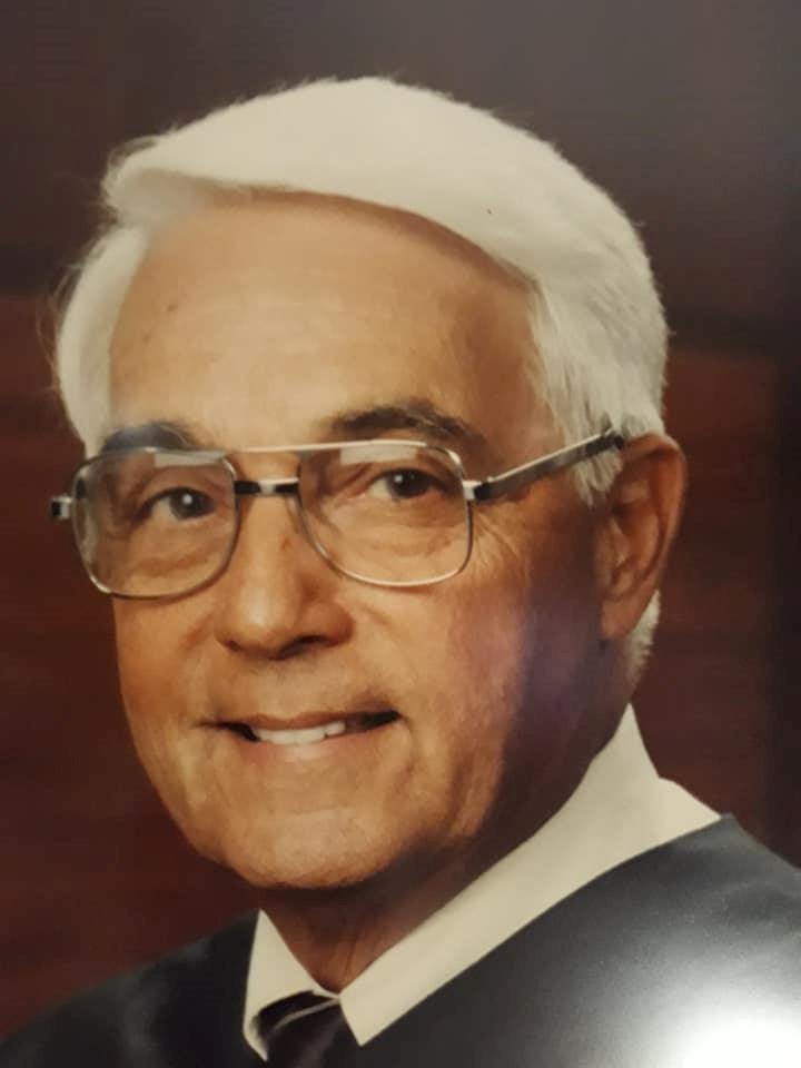 Obituary of Louis M Moore