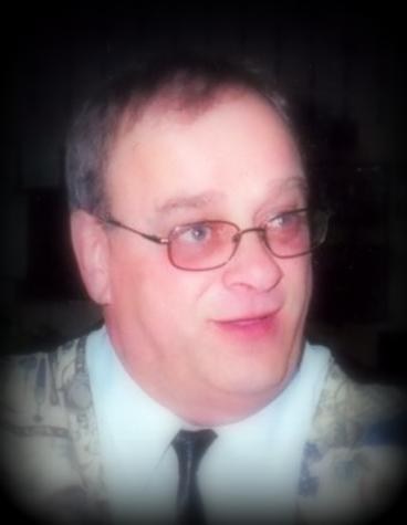 Obituary of M. Robert Girard