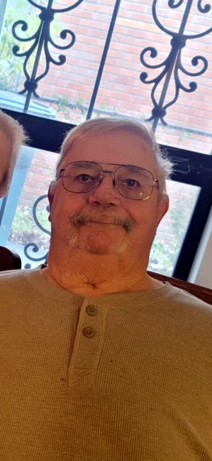 Obituary of Raymond Earl Moore