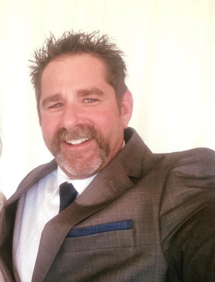 Obituary of Mark E. Warren