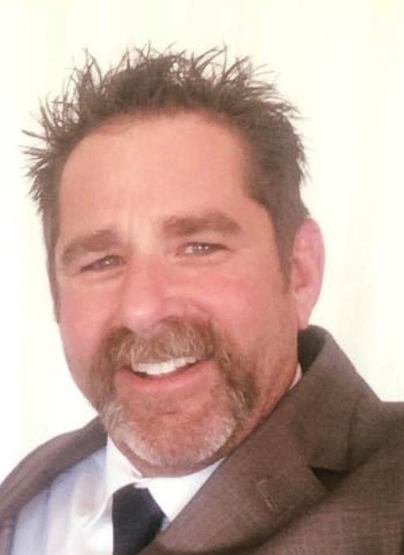 Obituary of Mark E. Warren