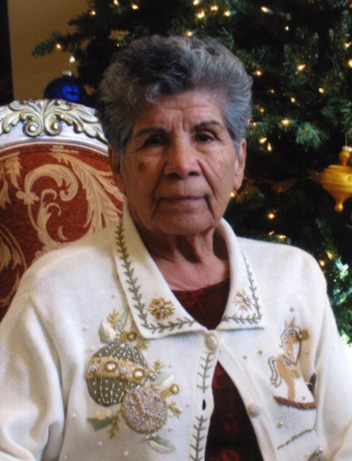 Obituario de Consuelo Flores