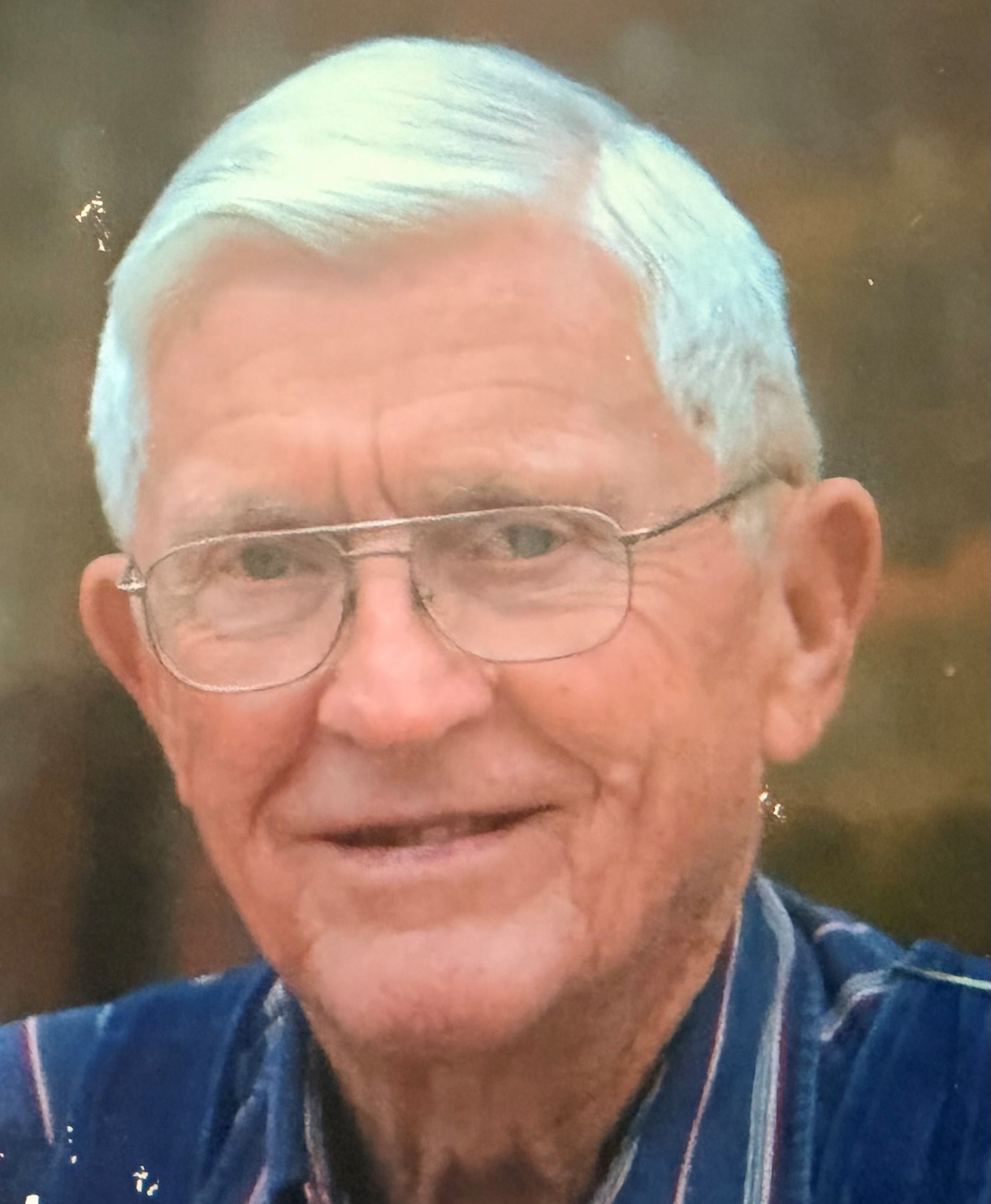 Obituary of Arnold Mills